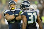 Seattle's Bruce Irvin strikes a pose after sacking Panthers quarterback Cam Newton in the fourth quarter.