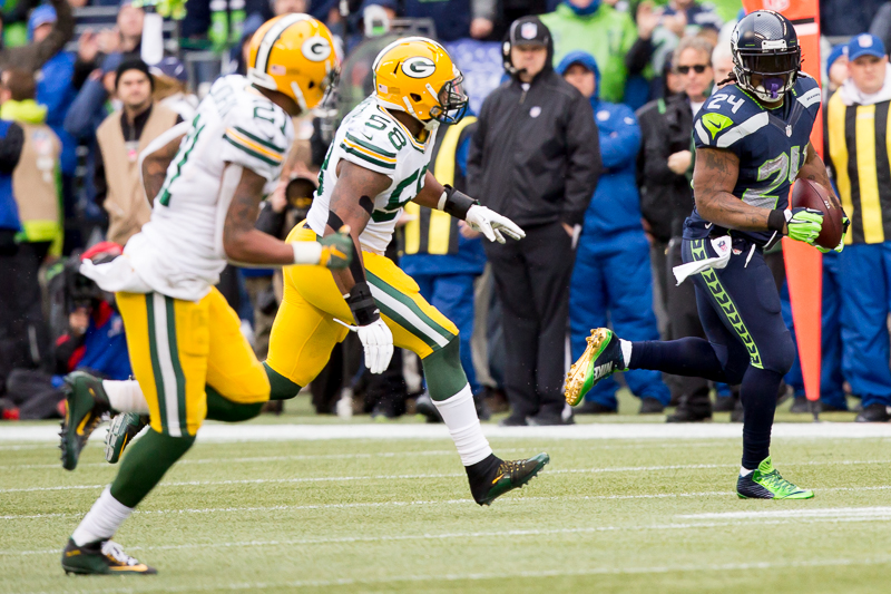 Seattle running back Marshawn Lynch rumbles upfield after breaking free of the Pack in the second quarter.