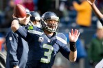 Seahawks' quarterback Russell Wilson warms up before the game.
