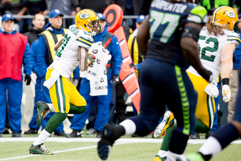 Green Bay safety Ha Ha Clinton-Dix returns a Wilson interception in the first quarter.
