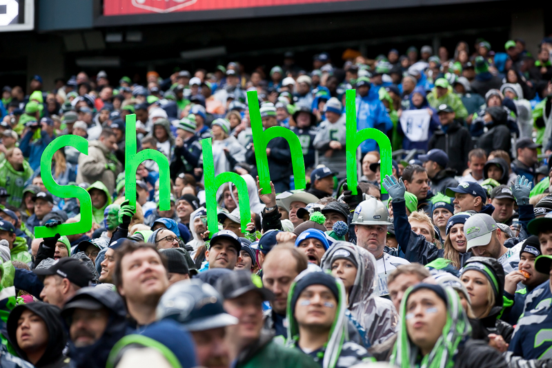 Fans urge quiet so the Hawks can concentrate on a third and long attempt during the first quarter.