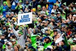 The 12th Man comes alive during the first quarter as Green Bay threatens to score.