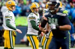 Green Bay kicker Mason Crosby congratulates teammates after hitting a 19-yard field goal in the first quarter to put Green Bay up 6-0.