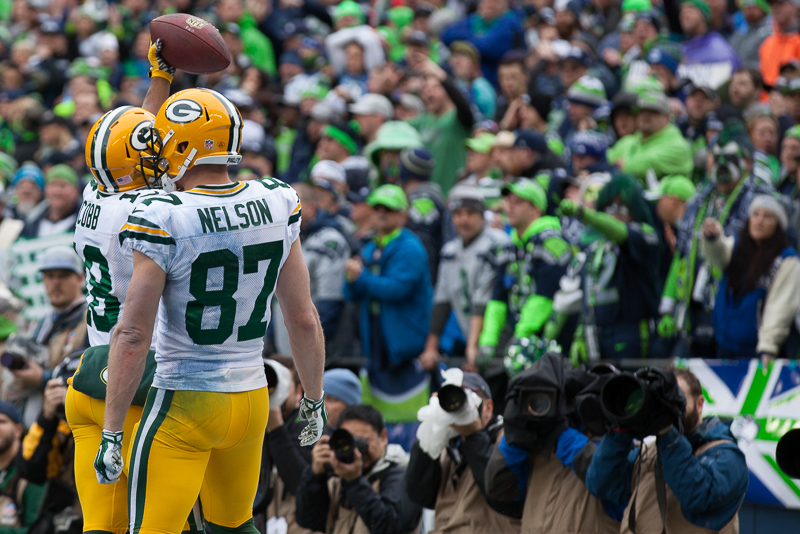 Green Bay receiver Randall Cobb celebrates his first quarter touchdown, putting the Packers up 13-0.
