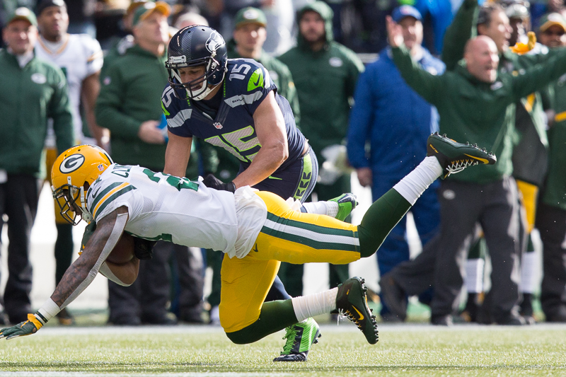 Green Bay safety Ha Ha Clinton-Dix is tackled after returning an interception for a 27-yard gain in the second quarter.