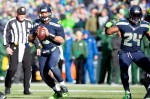 Russell Wilson drops back and reviews his options during a second-quarter play.
