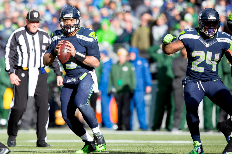 Russell Wilson drops back and reviews his options during a second-quarter play.