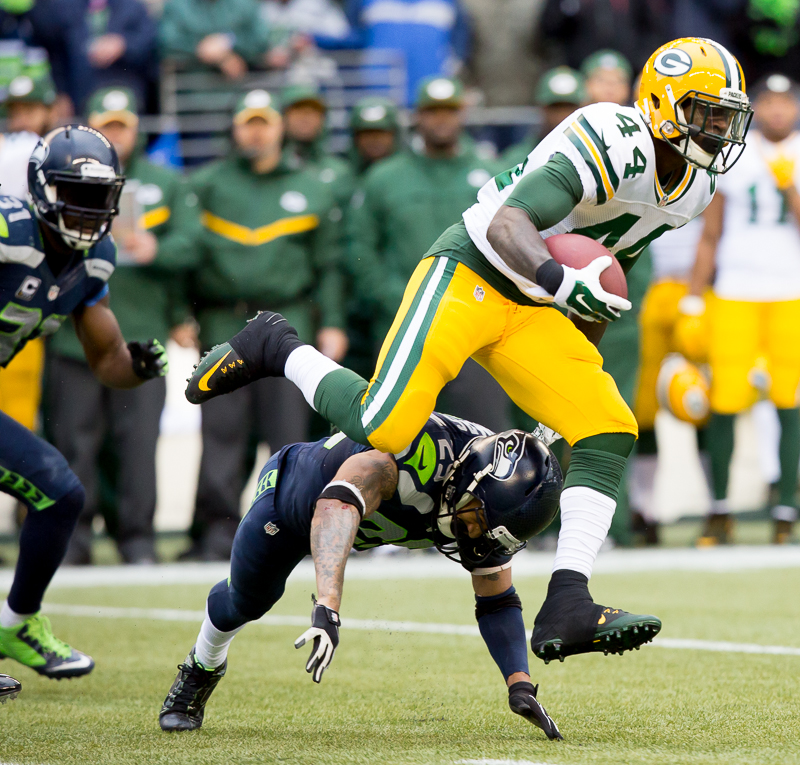 Packer running back James Starks rumbles upfield for a gain.
