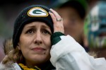 A Green Bay fan laments her team's turn of fortune late in the fourth quarter.