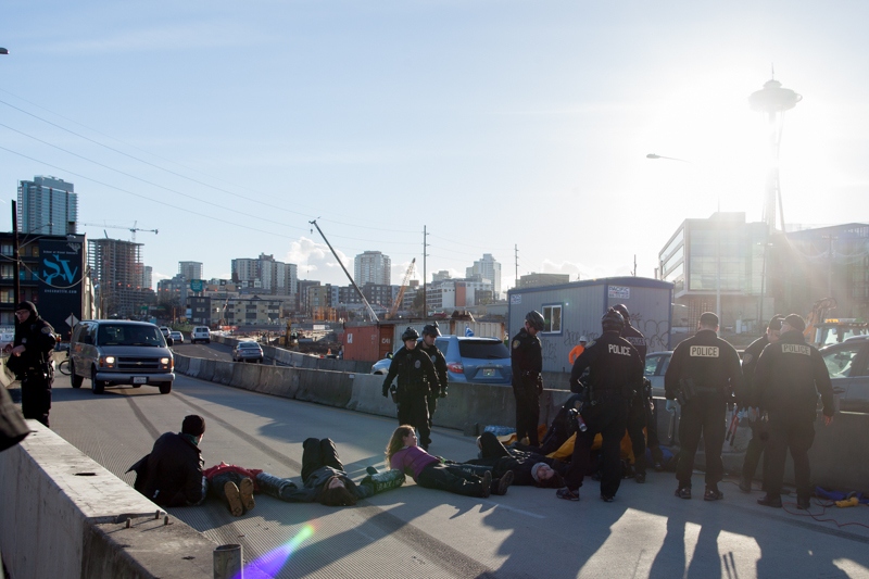 Protesters stretch across both lanes of northbound SR 99.