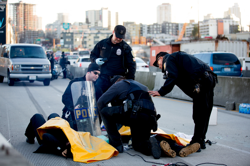 Photo by Jeremy Dwyer-Lindgren Protestors demonstrating against police brutality and the shooting