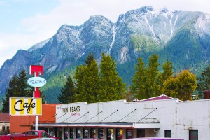 Bicycle bells and birdsong, sun-dappled lawns green as newly minted fairways. Stroller