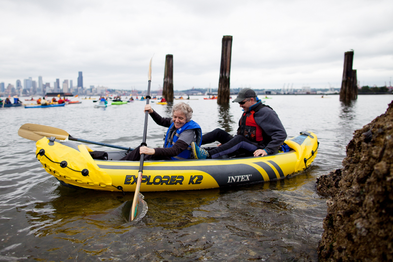 Protestors push off the beach, ready to head into the Bay.