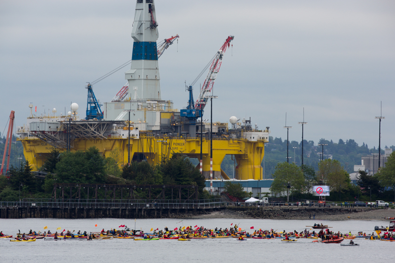 Hundreds of kayaktivists assemble within sight of the Polar Pioneer oil rig.