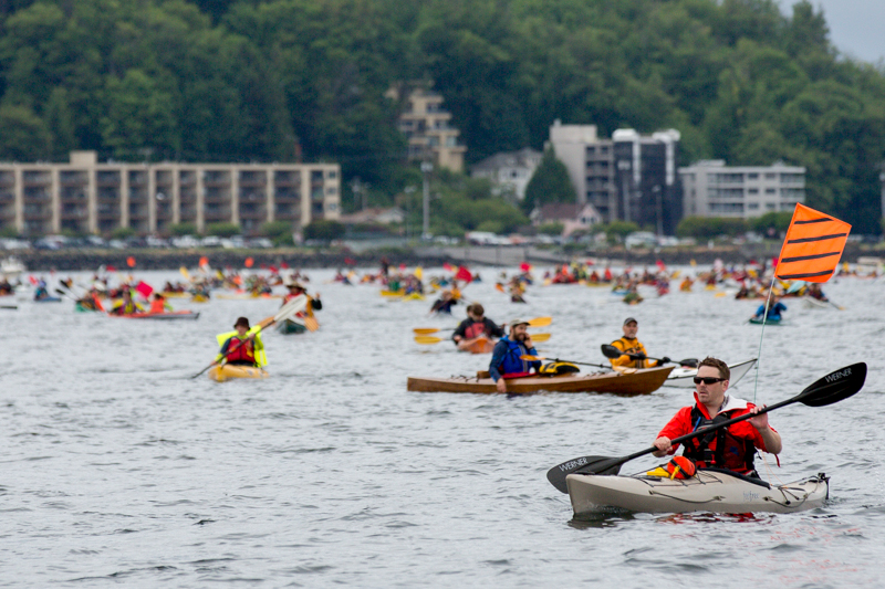 Hundreds of kayaktivists paddle through Elliot Bay to the mouth of the Duwammish to protest Shell's Polar Pioneer oil rig, moored nearby.