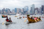 Hundreds of kayaktivists paddle back to shore following the waterborne demonstration.
