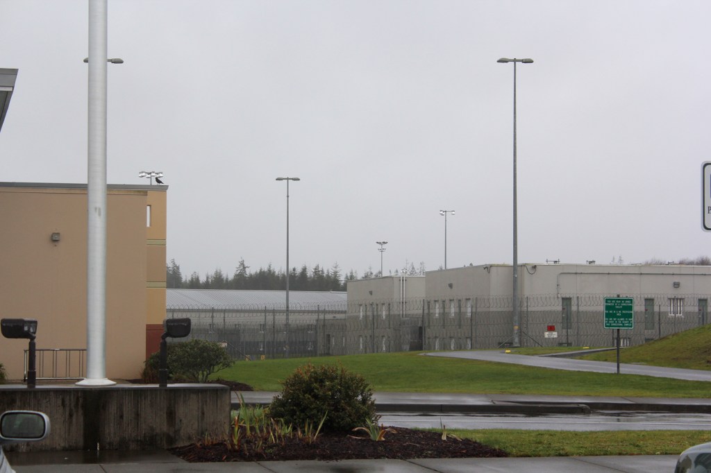 The Stafford Creek Corrections Center, near Aberdeen, under a slate-gray sky.