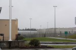 The Stafford Creek Corrections Center, near Aberdeen, under a slate-gray sky.