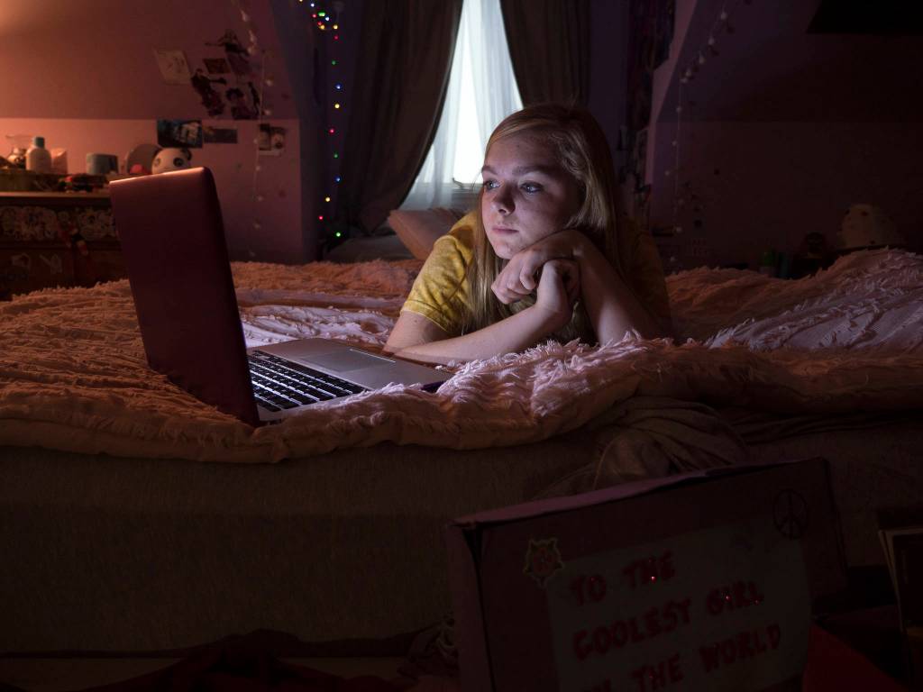 Elsie Fisher stays glued to her screens in Eighth Grade. Photo by Linda Kallerus/A24