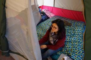 Photo by Melissa Hellmann                                 Christy X lives in a tent inside her apartment because she says that pests make the unit uninhabitable.