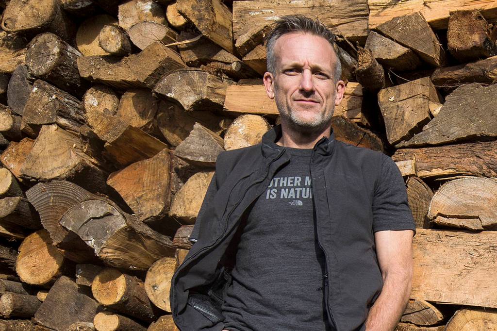 Woodchopping dad thwarts alleged burglar with help from son