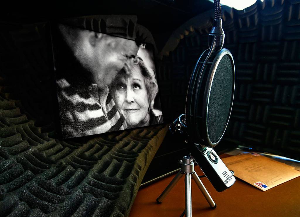 A small home studio Kerr intends to use for podcasts contains a microphone, sound-proofing material, and a picture of him with his wife Treena, who died in 2015. (Dan Bates / The Herald)