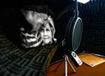 A small home studio Kerr intends to use for podcasts contains a microphone, sound-proofing material, and a picture of him with his wife Treena, who died in 2015. (Dan Bates / The Herald)