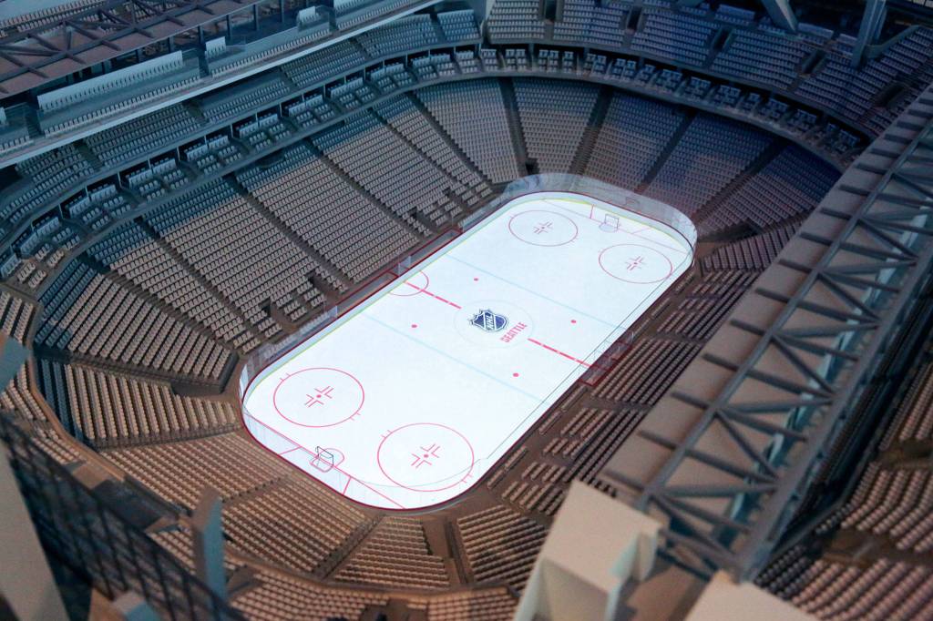 A scale model of the renovated KeyArena on display at the Pacific Science Center during media day on April 18, 2019, in Seattle. (Kevin Clark / The Herald)