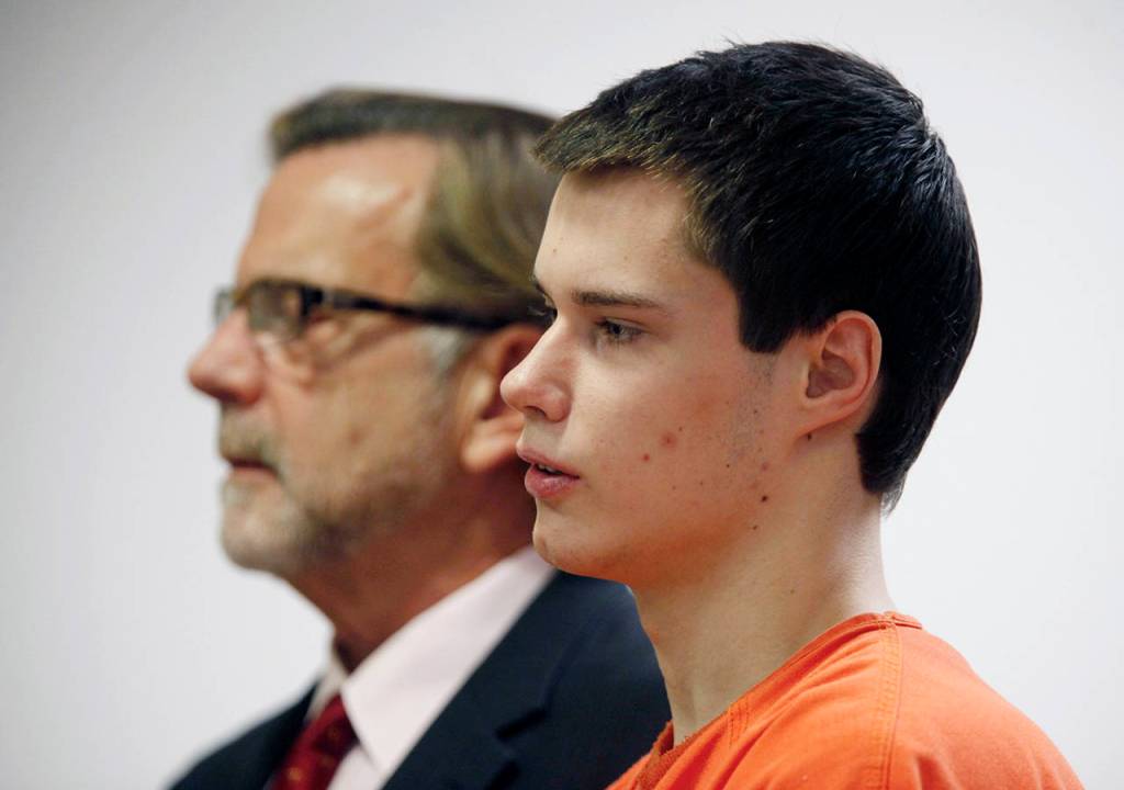 Colton Harris-Moore stands in front of Judge Vickie I. Churchill in Island County Superior Court to enter guilty pleas to 15 charges and an Alford Plea to one firearms charge in Coupeville on Dec. 16, 2011. (Mark Mulligan / Herald file)