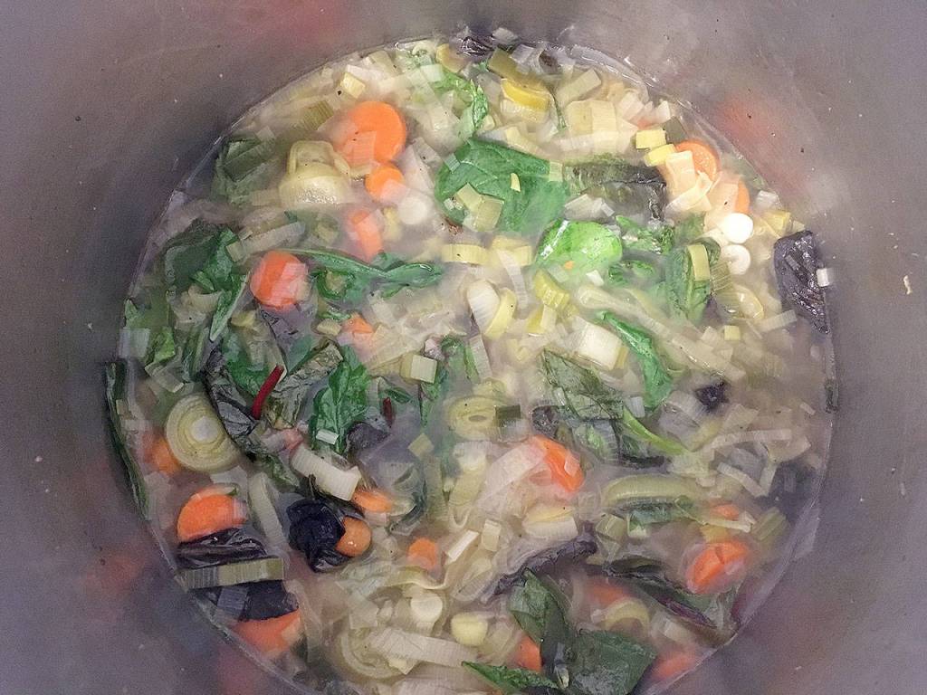 Leek soup, a recipe from InnAtTheCrossroads.com, makes for a light and filling dish with a variety of vegetables. (Ben Watanabe / The Herald)