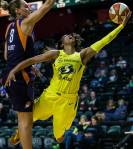 Seattles Jordin Canada (right) yells after being fouled by Phoenixs Stephanie Talbot during a preseason game against Phoenix on Wednesday at Angel of the Winds Arena in Everett. (Olivia Vanni / The Herald)