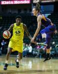 Seattles Natasha Howard dribbles around Phoenixs Stephanie Talbot during a preseason game against Phoenix on Wednesday at Angel of the Winds Arena in Everett. (Olivia Vanni / The Herald)