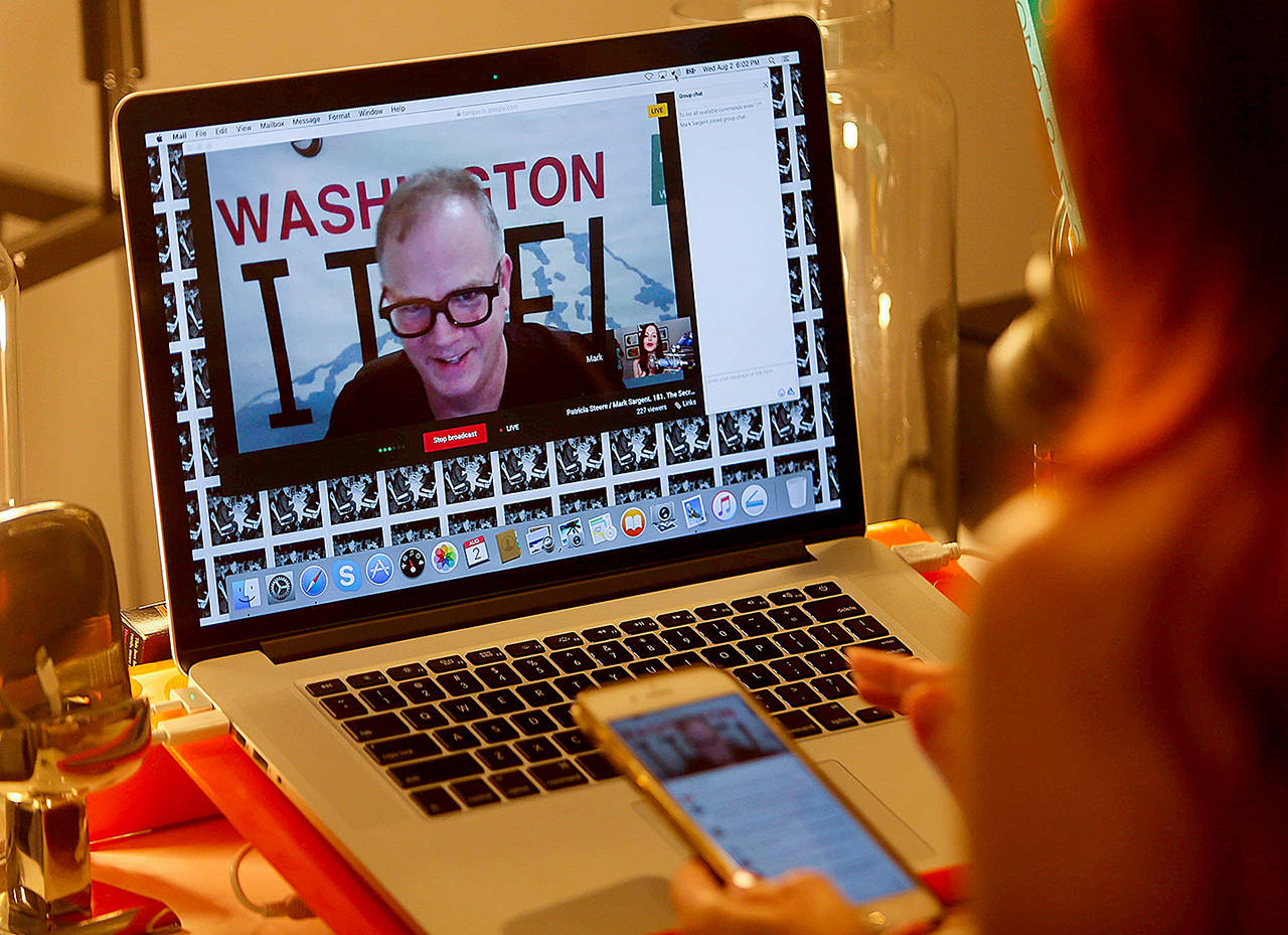 Mark Sargent of Whidbey Island is on the screen with Texas YouTuber Patricia Steere as she broadcasts The Flat Earth and Other Hot Potatoes from her Houston home. The two also share cameo roles (and some sexual tension) in the documentary Behind the Curve which was picked up by Netflix. (Mark Mulligan / Houston Chronicle)