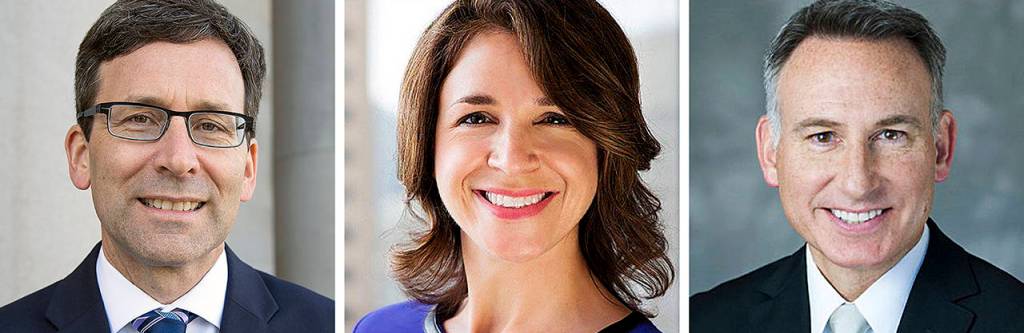 From left: state Attorney General Bob Ferguson, Commissioner of Public Lands Hilary Franz and King County Executive Dow Constantine.