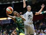 The Storms Jewell Loyd shoots as the Lynxs Jessica Shepard defends during a game on June 4 at the Angel of the Winds Arena in Everett. (Andy Bronson / The Herald)