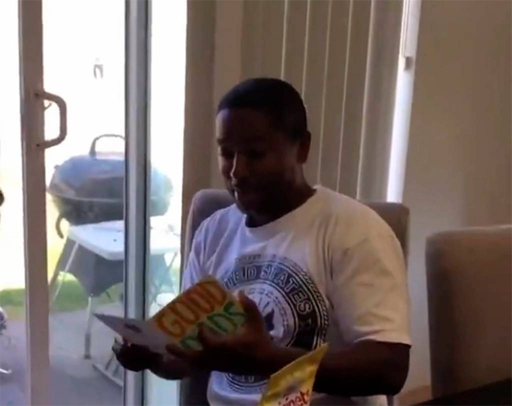 Photos from the viral video of two Renton women surprising their stepfather with changing their last names to his on Fathers Day, Sunday June 16.