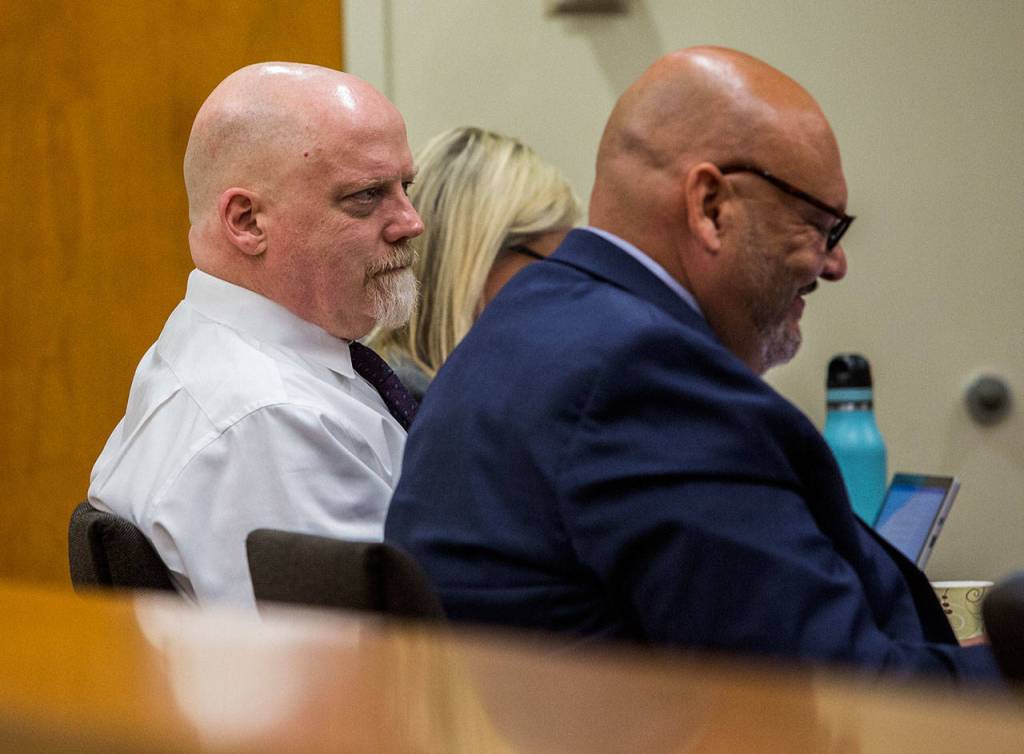 William Talbott II talks with his counsel during his trial at the Snohomish County Courthouse on Monday in Everett. (Olivia Vanni / The Herald)