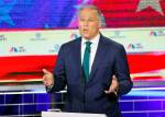 Democratic presidential candidate and Washington Gov. Jay Inslee speaks during a primary debate hosted by NBC News in Miami on Wednesday. (AP Photo/Wilfredo Lee)