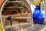 Crews walk the autoclave at the new 777x Composite Wing Center at Paine Field in Everett on May 19, 2016. (Kevin Clark / Herald file)