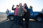 John Norman, his wife, Heather (right), and daughter Amber Nelson watch as his replica of the Spirit of St. Louis takes off on its first flight from Arlington Municipal Airport on July 28. (Andy Bronson / The Herald)