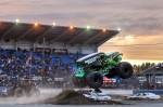 Identity Theft, driven by Marvin Anderson, jumps an obstacle Friday evening during the Evergreen State Fair at the Evergreen Speedway in Monroe. (Kevin Clark / The Herald)