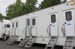 Cast trailers for Three Busy Debras filming at the Snoqualmie YMCA parking lot on Sept. 4. Madison Miller / staff photo