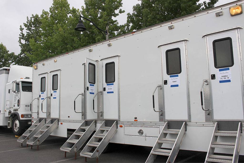 Cast trailers for Three Busy Debras filming at the Snoqualmie YMCA parking lot on Sept. 4. Madison Miller / staff photo