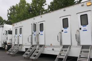 Cast trailers for Three Busy Debras filming at the Snoqualmie YMCA parking lot on Sept. 4. Madison Miller / staff photo