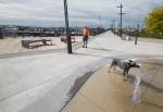 Pepper takes a drink from the new water fountain display while on a walk with his owner, Mike Williams, at the Port of Everett on Wednesday in Everett. The Boats Afloat Show, which has been held on Seattles South Lake Union for some 30 years, is relocating to the Port of Everett next fall. (Andy Bronson / The Herald)
