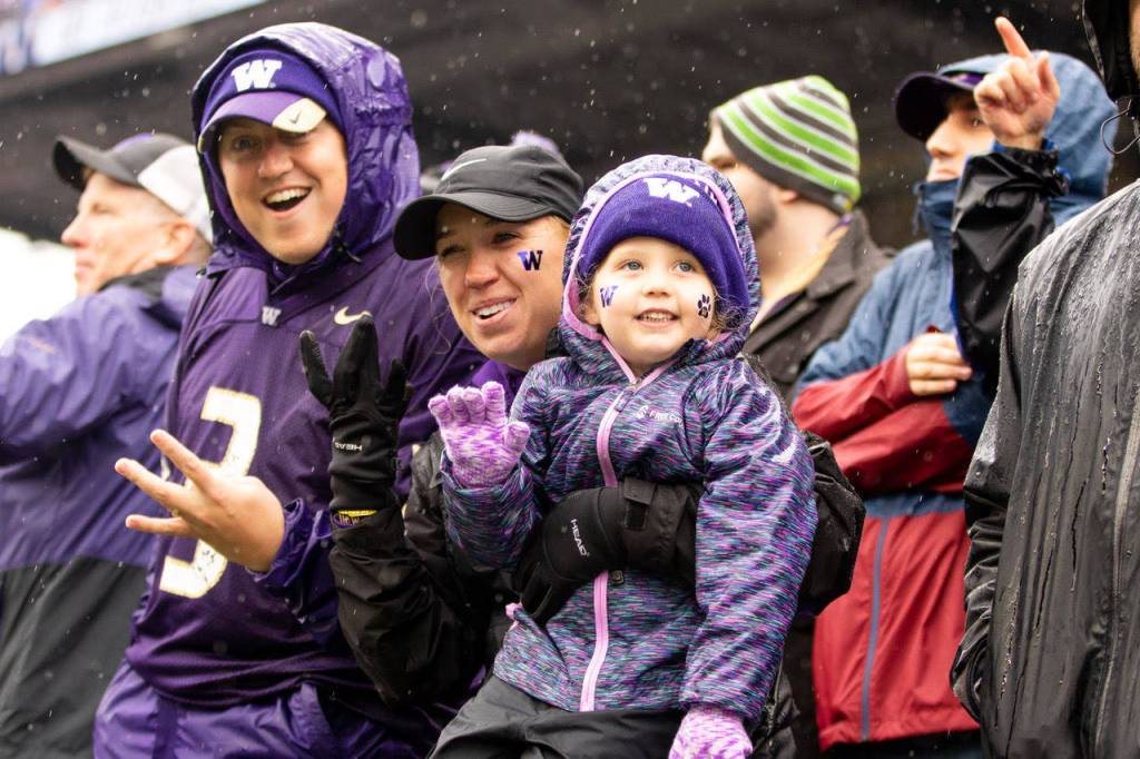 Fans cheer on the Huskies.