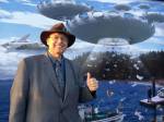 Michael W. Hall, at the Burien UFO Festival, stands in front of a mural depicting what UFO buffs claim happened in the 1947 Maury Island incident. Hall, a semi-retired Edmonds attorney, started a group called UFOiTeam in 2017. (Submitted photo)