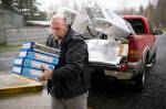 Gary Ray, then pastor of the Oso Community Chapel, carries chocolate bars for victims of the Oso mudslide on March 27, 2014, near Oso. (Jordan Stead, seattlepi.com, file)