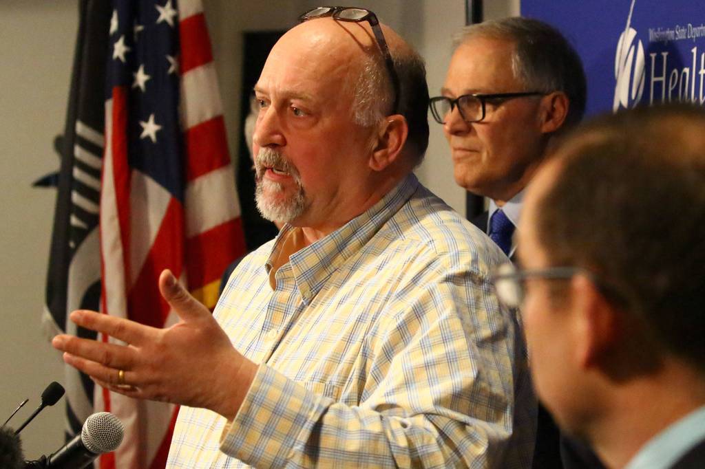 Dr. Scott Lindquist, state epidemiologist for communicable disease, takes a question during a news conference Tuesday afternoon at the state Public Health Laboratories in Shoreline. (Kevin Clark / The Herald)