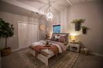 The master bedroom of the remodeled Everett home that will be in an episode of the HGTV series Unsellable Houses (Olivia Vanni / The Herald)